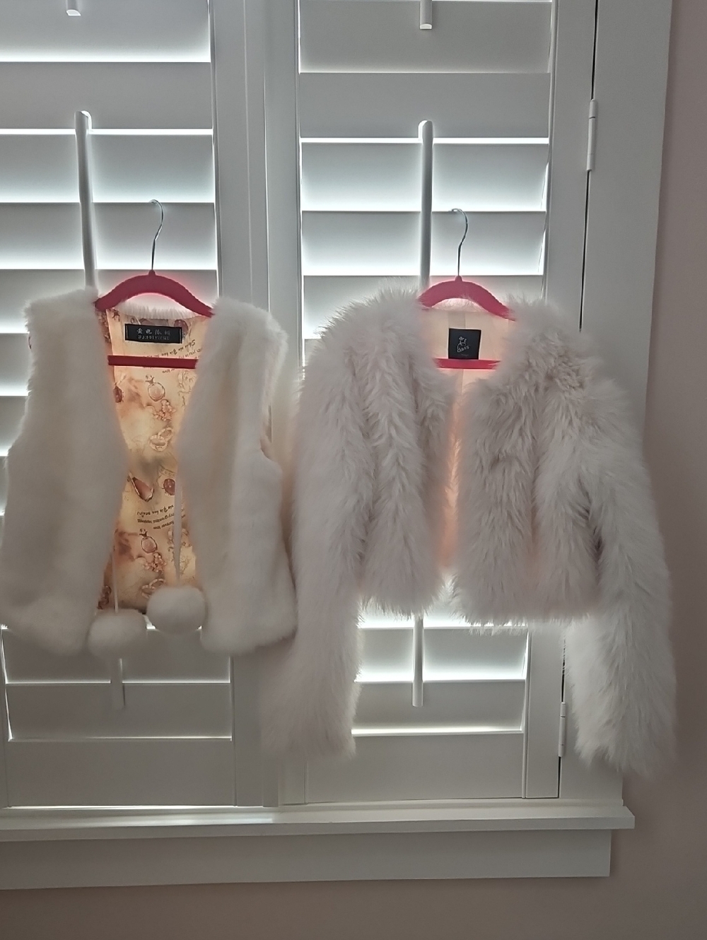 Pair of White Faux Fur Shrugs